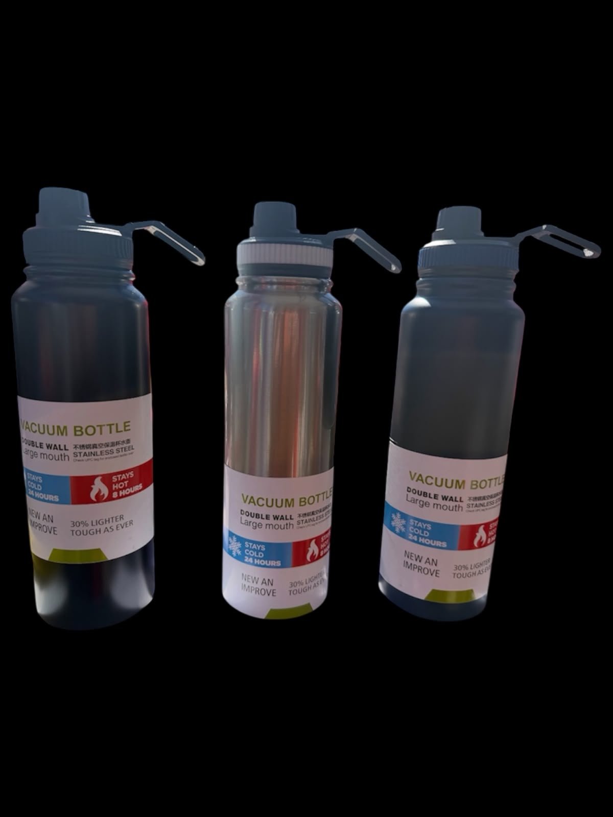 Tres botellas térmicas de acero en colores oscuros y plata