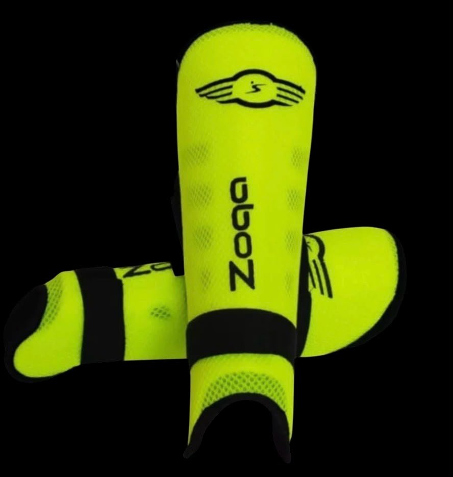 Canilleras flexibles Zoqa amarillo flúor