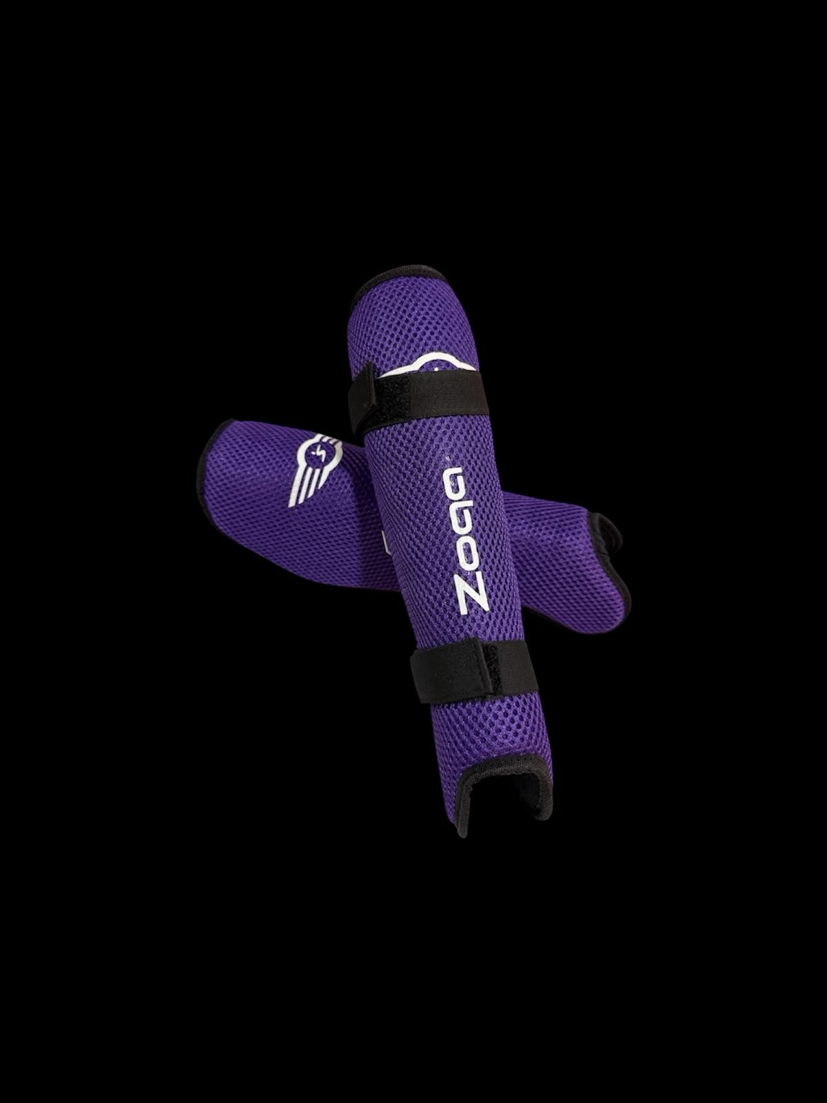 Canilleras flexibles Zoqa moradas