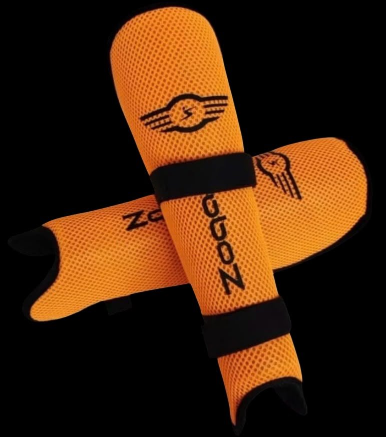 Canilleras flexibles Zoqa naranjas