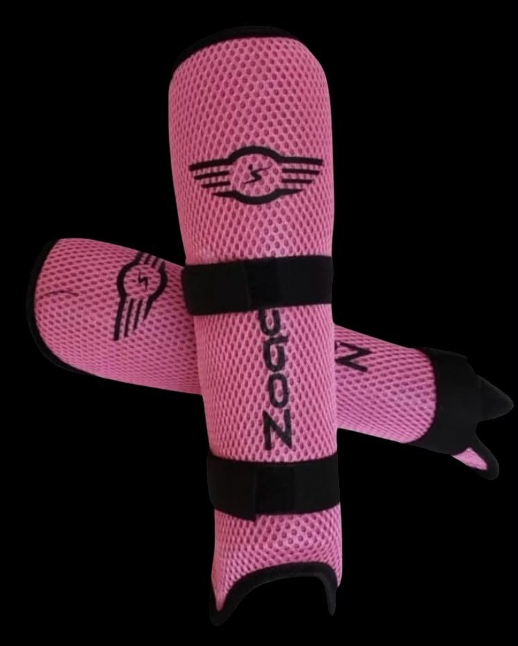 Canilleras flexibles Zoqa rosadas